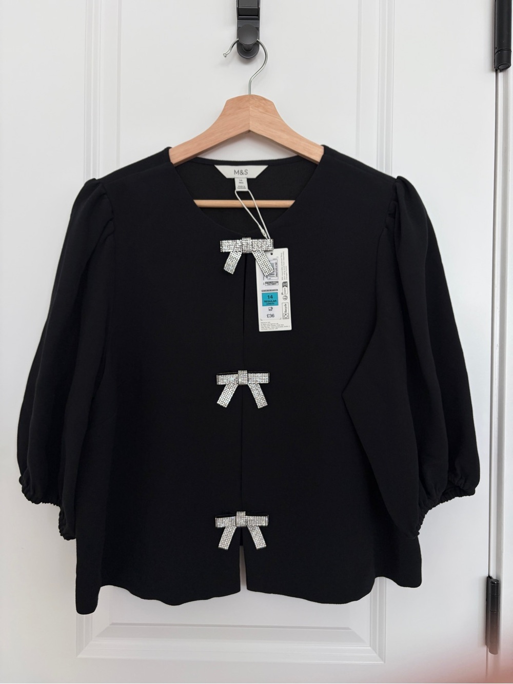 Marks & Spencer Black Puff Sleeve Top with Crystal Bow Accents